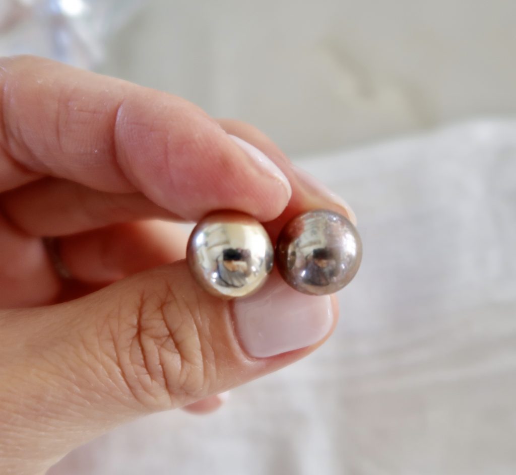 Silver earrings - left is cleaned, right is tarnished. 