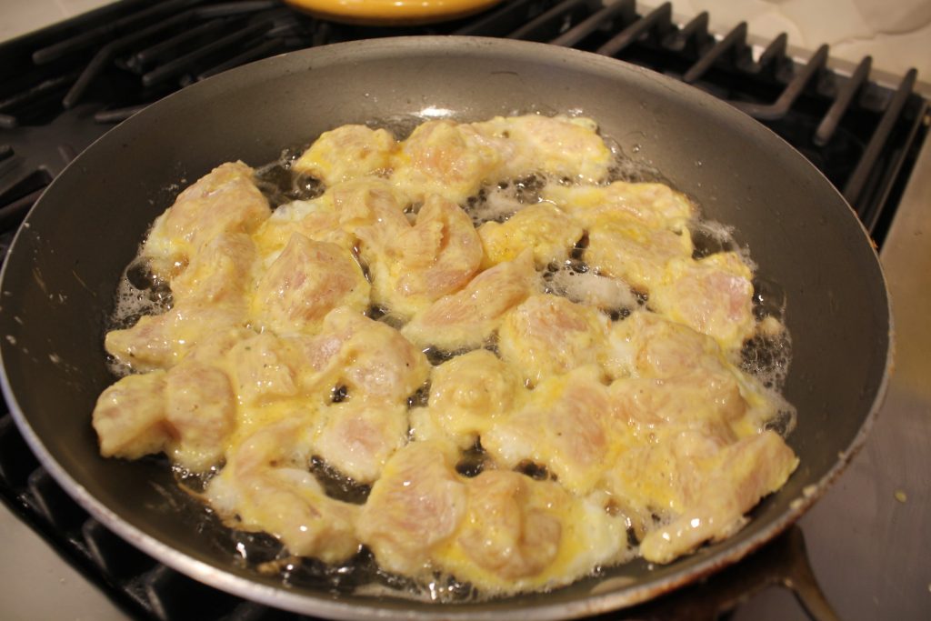 crispy sweet and sour chicken in fry pan