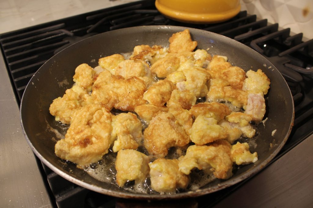 crispy sweet and sour chicken in fry pan