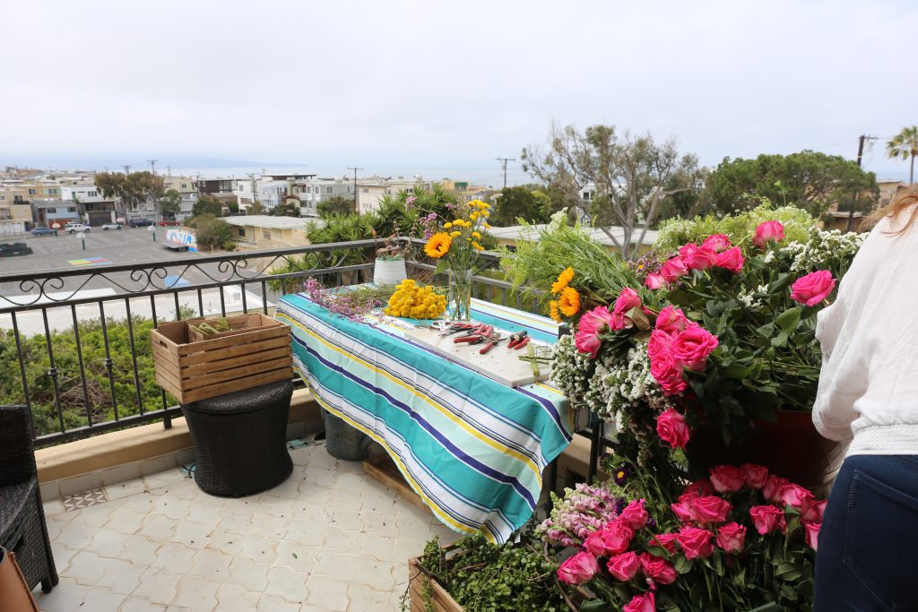 flower arranging party set up outside