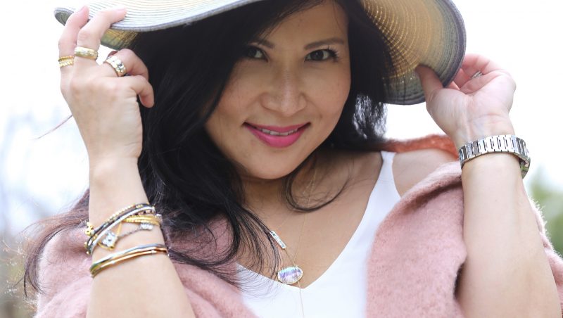 40something asian woman with fine jewelry