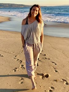 woman walking on beach